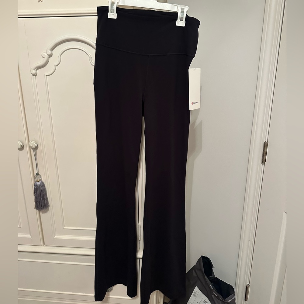 NWT size 8 lululemon groove nulu flared pants never worn tags still attached!!!